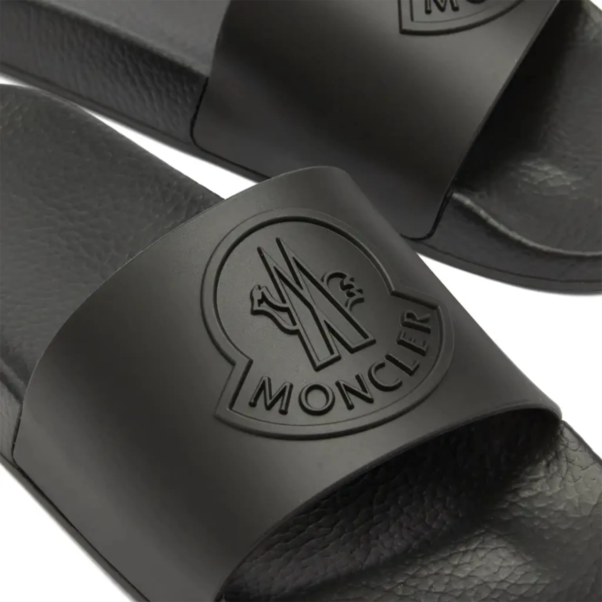 Detail view of Moncler Basile Black Sliders J109A4C00030M2999999